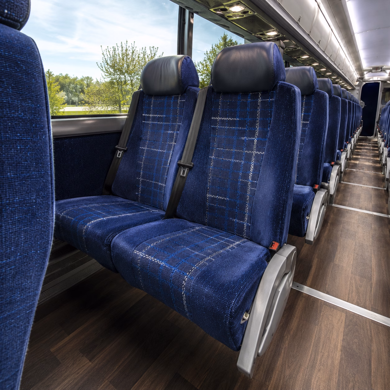 how starting location and deadhead affect charter bus rates in lansing michigan